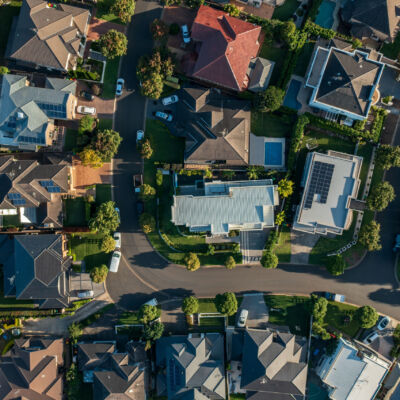 Top down aerial view of an upmarket neighbourhood with houses and streets, Sydney, Australia