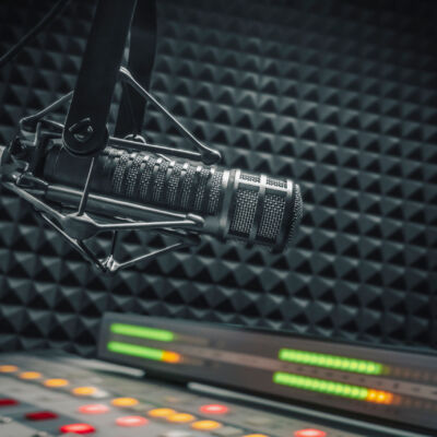 Professional microphone and sound mixer in radio station studio